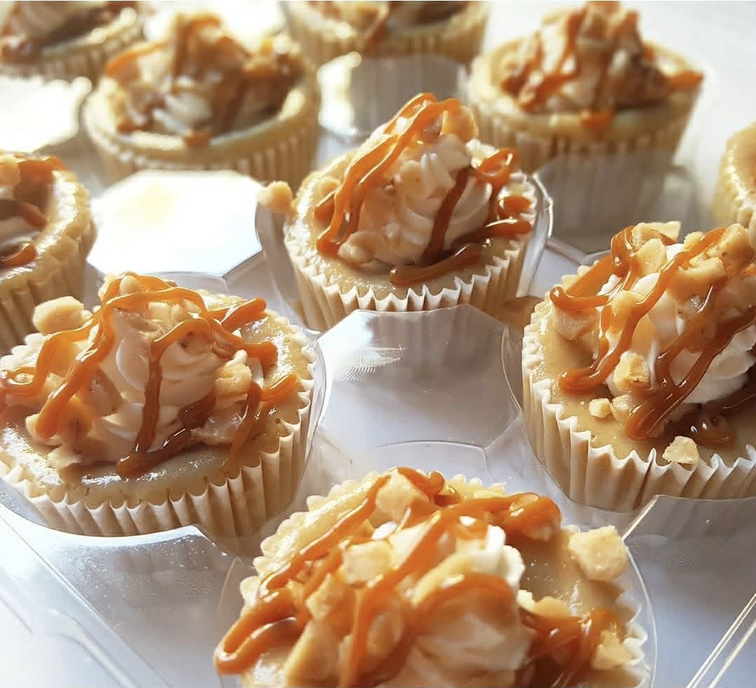 Dulce de leche mini cheesecakes drizzled with caramel