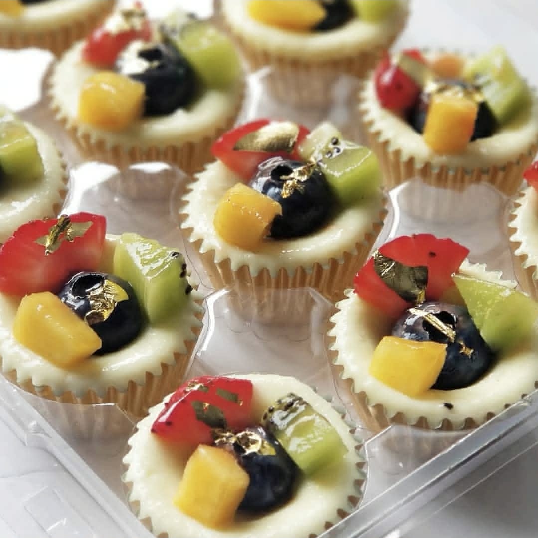 New Yorker mini cheesecakes finished with fresh seasonal fruit